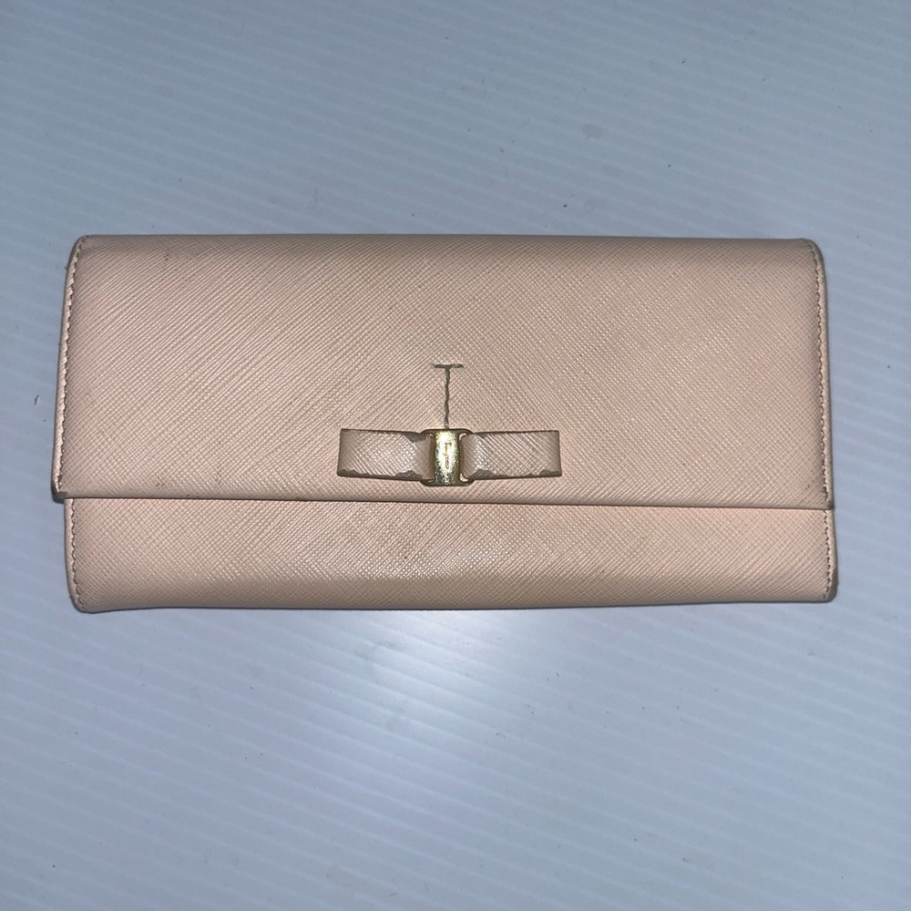 Vintage Ferragamo wallet with bow.